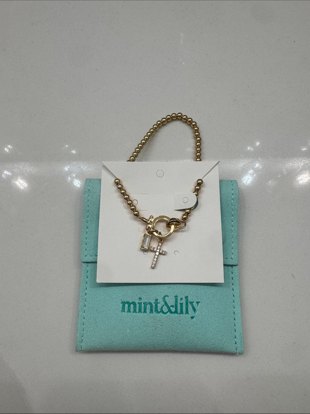 Mint & Lily Gold Charm Bracelet with Cross and Crystal